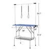 A grooming table with a blue surface and metal frame, featuring dimensions indicated by text and lines. Anteprima dell’immagine prodotto