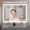A woman is looking into a lighted bathroom mirror with water droplets on it, suggesting it is fog-free. Produktbild-Vorschau