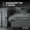 A bedroom scene with a bed and nightstand, featuring marketing text about a product. Produktbild-Vorschau