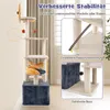 A multi-level cat tree with various platforms, hammocks, and scratching posts, presented with overlaid text highlighting its stability features. Anteprima dell’immagine prodotto