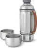 A silver thermos bottle with two silver cups next to it, on a white background. Voir les images du produit