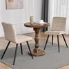 Two beige chairs and a small wooden table in a room. Náhľad obrázku produktu
