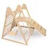 A wooden indoor playground structure with a slide, swing, and climbing net. Produktbild-Vorschau