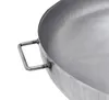 A close-up view of the handle and rim of a metal fire pit. Produktbild-Vorschau