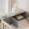 A close-up view of a multifunctional high bed with storage and a wardrobe, featuring a teddy bear on a toy airplane and a shopping bag on a shelf. Voir les images du produit