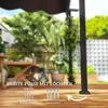A backyard scene with a pergola leg and accessories for installation. Náhľad obrázku produktu