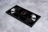 A framed double LP record cover displayed on a tiled floor. Anteprima dell’immagine prodotto