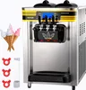 A commercial soft-serve ice cream machine with three dispensers and a digital display, shown with three ice cream cones and some accessories. Produktbild-Vorschau
