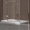 A close-up view of the base of a modern shower enclosure, showing the shower tray and glass door. Produktbild-Vorschau