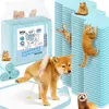 A product image featuring pet training pads with various animals interacting with them. Náhľad obrázku produktu