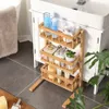 A bathroom shelf unit with various toiletries next to a sink. Produktbild-Vorschau