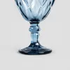 A close-up view of the base and stem of a blue glass goblet. Podgląd zdjęcia produktu