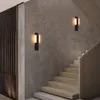Two wall lights illuminate a staircase in a modern interior. Anteprima dell’immagine prodotto