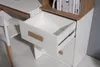 A close-up view of an open drawer on a white and wood-toned shelf unit, with books on the top shelf. Produktbild-Vorschau
