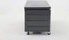 A dark gray storage box with four drawers and wheels, shown from the side against a light gray and white background. Produktbild-Vorschau