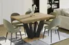 A dining table with chairs set up in a modern living room. Anteprima dell’immagine prodotto