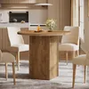 A dining table with chairs in a modern kitchen setting. Produktbild-Vorschau