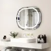 A modern bathroom vanity with a sink, mirror, and accessories. Voir les images du produit