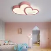 A child's bedroom with a pink heart-shaped ceiling light. Náhled obrázku produktu