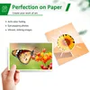 A hand holding a postcard with a butterfly on it, next to a graphic of a postcard with a sunflower. Produktbild-Vorschau