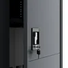 A close-up view of a metal cabinet lock with a key inserted. Produktbild-Vorschau