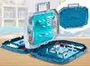 A Battleship board game is open and displayed on a wooden table, with a blurred background of a child's room. Produktbild-Vorschau
