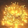 A close-up view of a tangled string of warm white LED lights. Anteprima dell’immagine prodotto