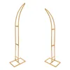 Two gold arch stands against a white background. Podgląd zdjęcia produktu