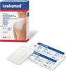 A box of Leukomed wound dressings and two individually packaged dressings. Voir les images du produit