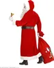A person dressed as Santa Claus holding a bell and a gift bag. Produktbild-Vorschau