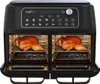 A black dual-chamber air fryer with two roasted chickens inside, displayed on a white background. Produktbild-Vorschau