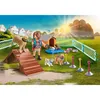 A Playmobil set depicting a dog trainer with dogs in an outdoor training area. Produktbild-Vorschau