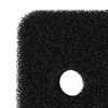 A close-up view of a black foam filter with a circular hole in the center. Produktbild-Vorschau