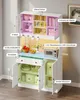 A white kitchen cabinet with various compartments and labeled features, including shelves, drawers, and a countertop. Voir les images du produit