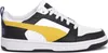 A side view of a single Puma sneaker. Voir les images du produit