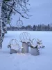 Decorative spheres with lights in a snowy outdoor setting. Produktbild-Vorschau