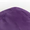 A close-up view of a purple beanbag chair. Produktbild-Vorschau