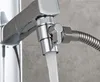 A close-up shot of a faucet diverter valve with water flowing through it. Produktbild-Vorschau