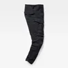 A pair of black cargo pants laid flat against a white background. Produktbild-Vorschau