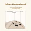 Close-up of the ports and controls of a portable speaker, with text overlays explaining its features and modes. Produktbild-Vorschau