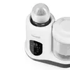 A close-up studio shot of a white baby food maker with a bottle and a jar. Produktbild-Vorschau