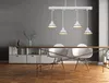 A dining room scene with a table, chairs, and a light fixture. Náhled obrázku produktu