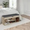 A shoe bench with storage is placed in front of a bed in a bedroom. Náhled obrázku produktu