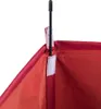 A close-up view of the top corner of a red fabric container, showing a black support rod inserted into a fabric sleeve with velcro fasteners. Náhľad obrázku produktu