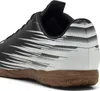 A close-up side view of a black and white Puma soccer shoe with a brown sole. Produktbild-Vorschau