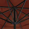 Close-up view of the internal structure of a brown umbrella, showing the metal frame and fabric. Produktbild-Vorschau