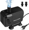 A black water pump with water spraying from the top, shown on a white background with accessories and a power cord. Produktbild-Vorschau
