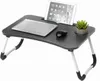 A foldable lap desk with a laptop, tablet, mouse, and a small potted plant on it. Anteprima dell’immagine prodotto