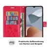 A red wallet-style phone case is open, showing card slots and a bill compartment, with a smartphone displayed in the other half. Text and an icon below describe its storage features. Produktbild-Vorschau