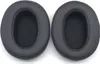Two black ear pads for headphones are shown against a white background. Produktbild-Vorschau